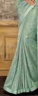 Aqua Green Color Embossed lycra Trendy Party Wear Sarees OS-94387 - onlinesareez