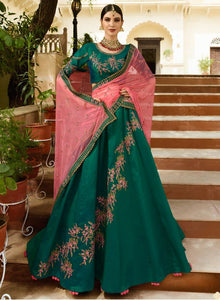 शादी समारोह के लिए रामा ग्रीन मखमली रेशम डिजाइनर लहंगा: Kreshti संग्रह OS-93309